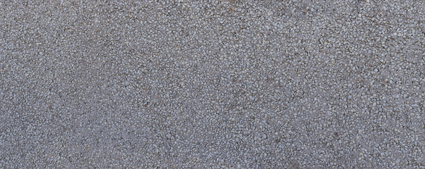 Background of textured monocouche wall with projected stone, small grain in shades of gray and white