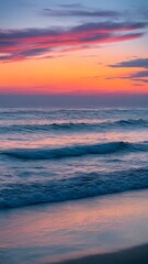 Obraz premium Serene Coastal Beach Scene at Dusk Mobile Wallpaper
