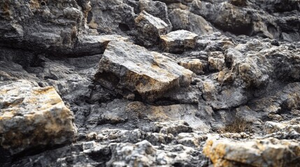 Rugged rocky terrain featuring scattered stones cut out for emphasis