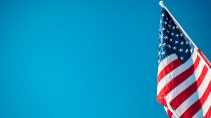 Obraz premium American flag background with a clear blue sky