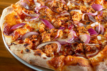 A view of a BBQ chicken pizza.