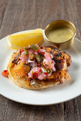A view of a grilled chicken taco.