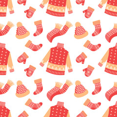 Seamless pattern with knitted winter clothes, Christmas mittens, hats, sweaters and socks. Holiday background for packaging