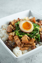 A view of a marinated pork belly rice bowl.