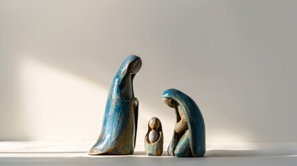 Three-piece wooden nativity set with Mary, Joseph, and baby Jesus