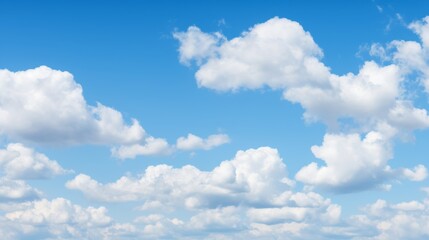 Fototapeta premium Clear blue sky with picturesque cumulus clouds creating a tranquil scene