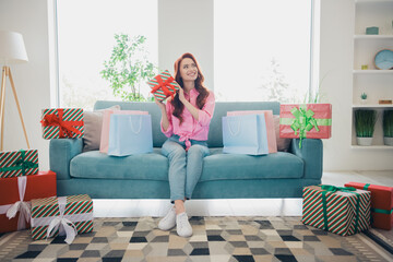 Full length photo of lovely young ginger girl sit couch celebrate birthday wondered dressed pink...
