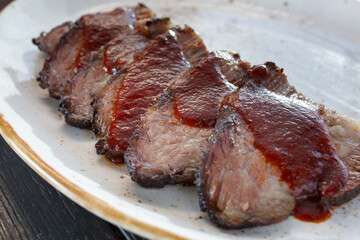 A closeup view of a portion of sliced tri tip.