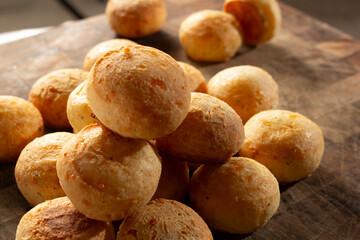A view of a pile of pao de queijo.