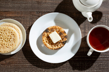 A top down view of a crumpet.