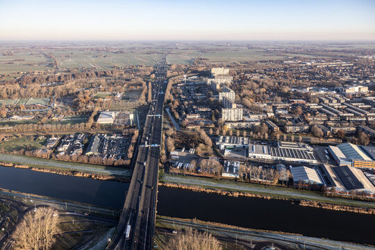 Skyline Dutch city Gorinchem with winter mist above the horizon