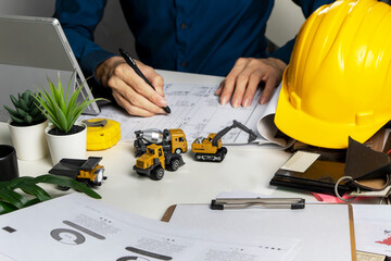 Project engineers calculate construction costs.,Cost of materials and labor for...