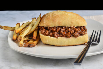sloppy joe  served on ciabatta roll served with french fries,