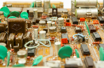 Parts and components on printed circuit boards close-up Electronic board with radio parts from...