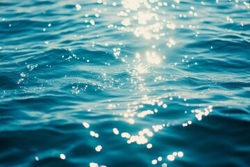 Sunlight sparkling on calm ocean waves in a tranquil seascape
