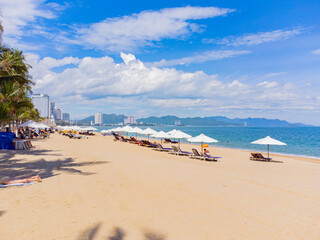 City beach.

Nha Trang is a resort city in Vietnam. It's a sunny day. Shooting from a drone.