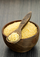 Japanese yellow panko crumbs in spoon and bowl.