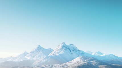 Fototapeta premium Snow-capped mountains under a clear blue sky, winter weather, cold and majestic.