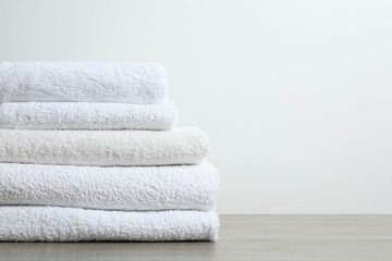 Stack of bath towels on the table