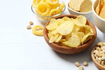 Various unhealthy snacks on table