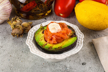 Whole grilled avocado with salmon