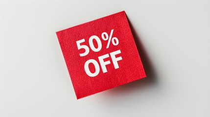 White '50% OFF' Text on a Red Square Paper Note. White Background with Copy Space