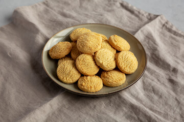 Homemade Cookies with Limoncello and candied lemon paste on a plate. Pasticcini al Limoncello