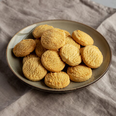 Homemade Cookies with Limoncello and candied lemon paste on a plate. Pasticcini al Limoncello