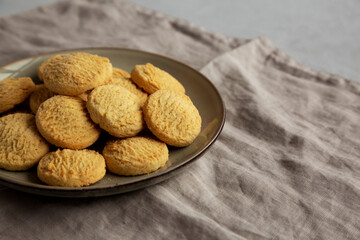 Homemade Cookies with Limoncello and candied lemon paste on a plate. Pasticcini al Limoncello