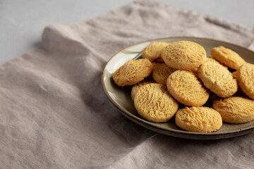 Homemade Cookies with Limoncello and candied lemon paste on a plate. Pasticcini al Limoncello