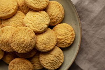 Homemade Cookies with Limoncello and candied lemon paste on a plate. Pasticcini al Limoncello