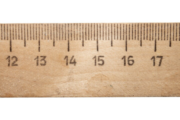 A wooden Soviet ruler on a white background.The measuring ruler is made of wood.