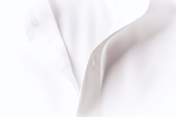 Close up of white Men's shirt.	