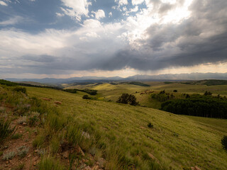 Thunderstorm over the rocky mountains panoramic dramatic view