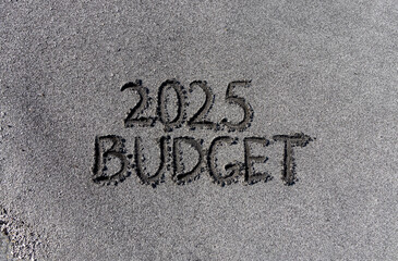 Planning budget 2025 new year symbol. Concept words Budget 2025 written on beautiful sand beach. Beautiful sand beach background. Business budget 2025 new year concept. Copy space.