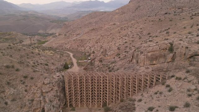 Aerial landscape view authentic mudflow control dam in Areni village, Armenia. Mud flow control dam structure in valley
