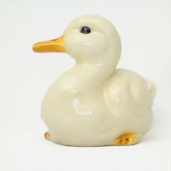 White Ceramic Duck Figurine Isolated on White Background. High quality photo