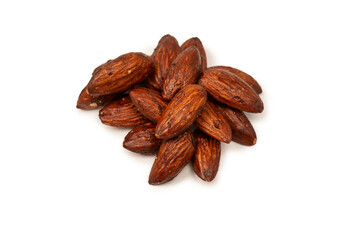 A group of caramelized almonds isolated on a white background.