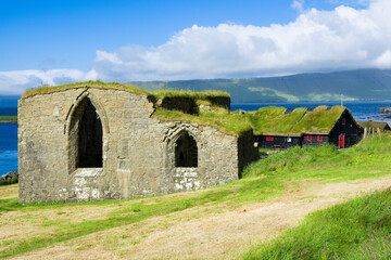 Historical Kirkjubøur village with ruins of the Magnus Cathedral, Faroe Islands