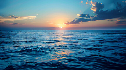 Amazing sunset over a calm sea. The sky is ablaze with color, and the water is like a mirror.