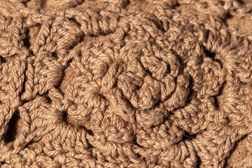 Knitted with crochet, hand -woven, macro, close -up. flower