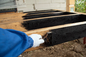 Waterproofing of wooden boards