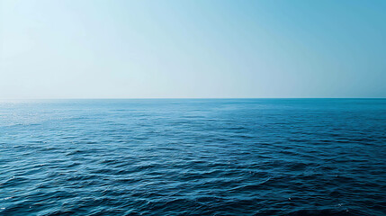Obraz premium Deep blue ocean with a clear horizon. The water is calm and serene.