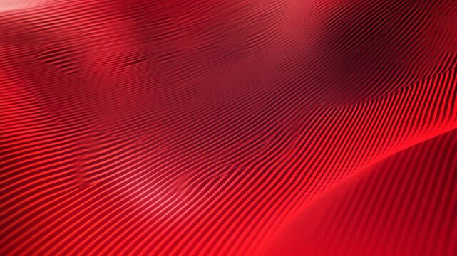 Red sand dunes create a wavy pattern in the desert