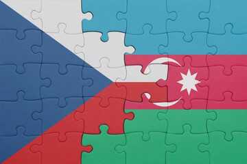 puzzle with the colourful national flag of czech republic and flag of azerbaijan .