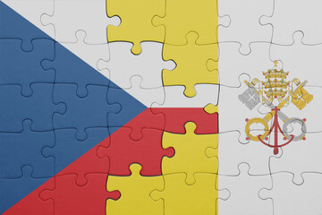 puzzle with the colourful national flag of czech republic and flag of vatican city .