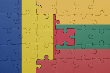 puzzle with the colourful national flag of romania and flag of lithuania .