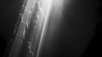 A beam of light shining down from the top left corner, with rays spreading out to form an abstract background on a black and white gradient background. Chiaroscuro Lighting. Illustration