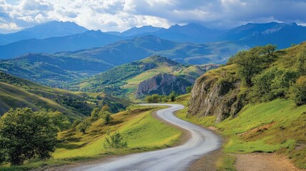 Naklejka premium Scenic mountain road with breathtaking views of the landscape