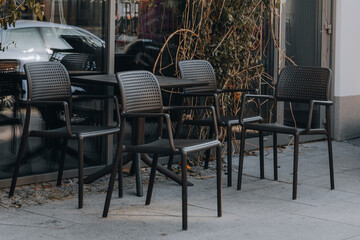 Table and chairs outside the restaurant after the season